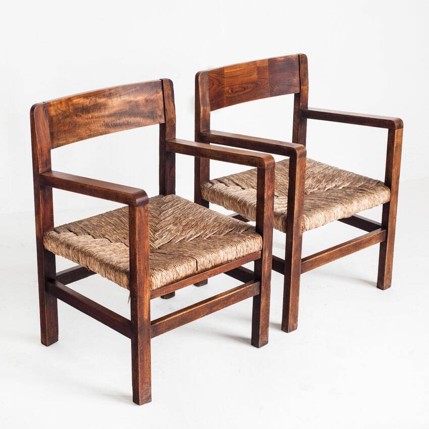 Pair of rustic armchairs in solid wood and straw seats. France, 1940s