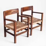 Pair of rustic armchairs in solid wood and straw seats. France, 1940s