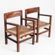 Pair of rustic armchairs in solid wood and straw seats. France, 1940s