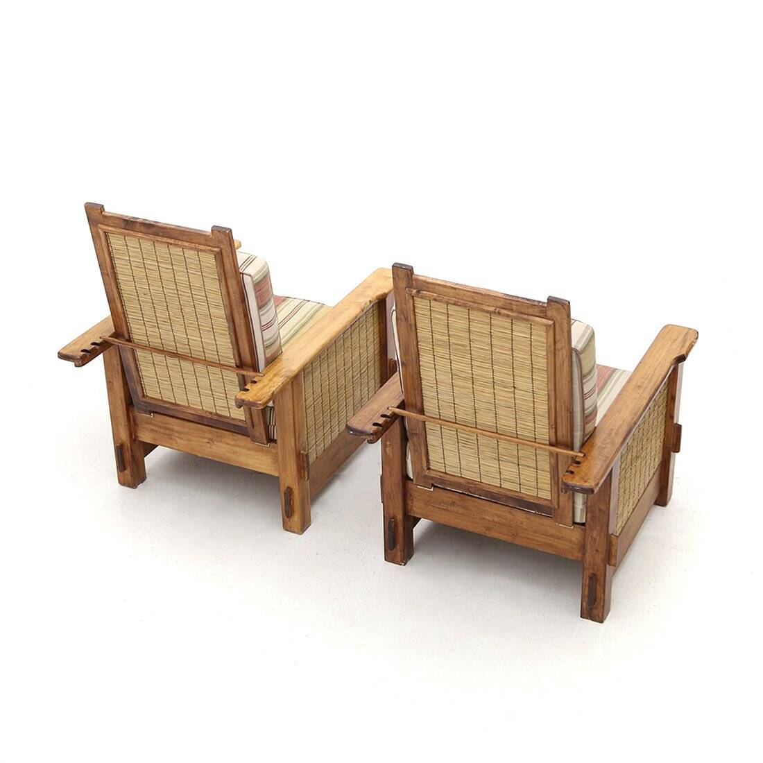 Set of South African colonial armchairs in wood and straw, 1980s.
