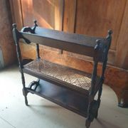Magazine/book rack in oak with a caned top - early 20th century