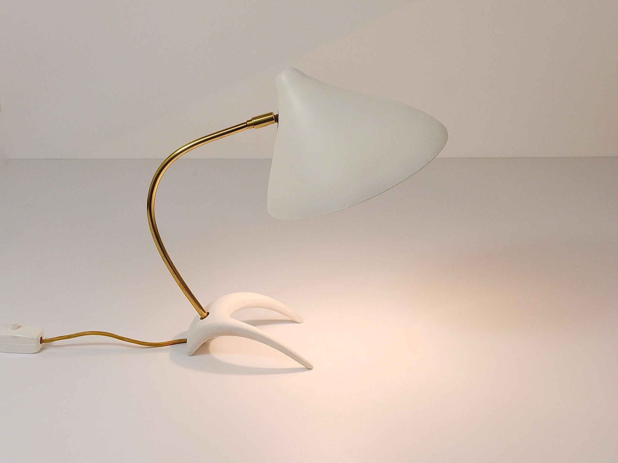 White brass desk or table lamp in the Louis Kalff style from the 1950s.