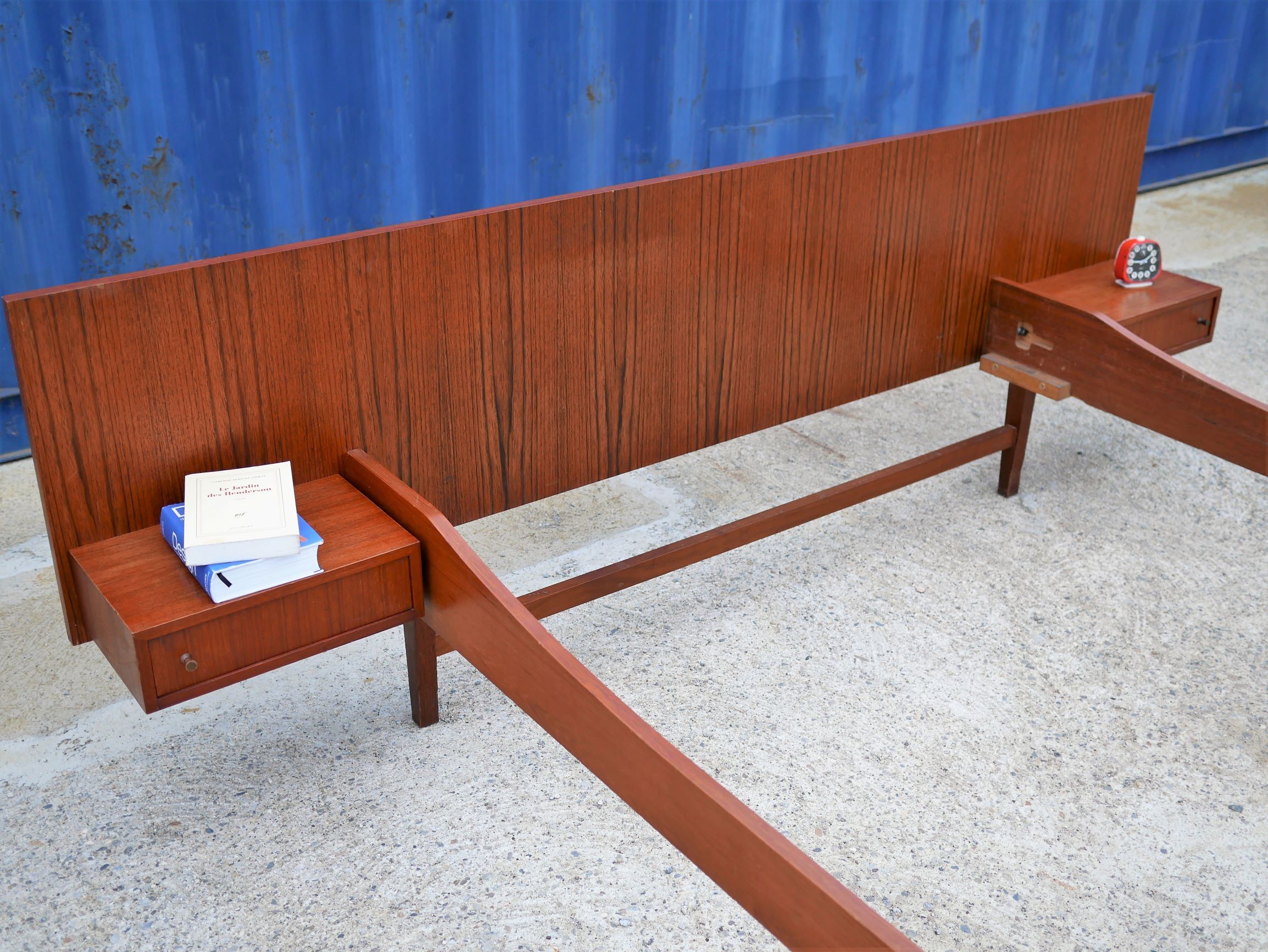 Teak bed with hanging bedside tables from the 60s