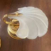 Pair of vintage polished glass shell sconces
