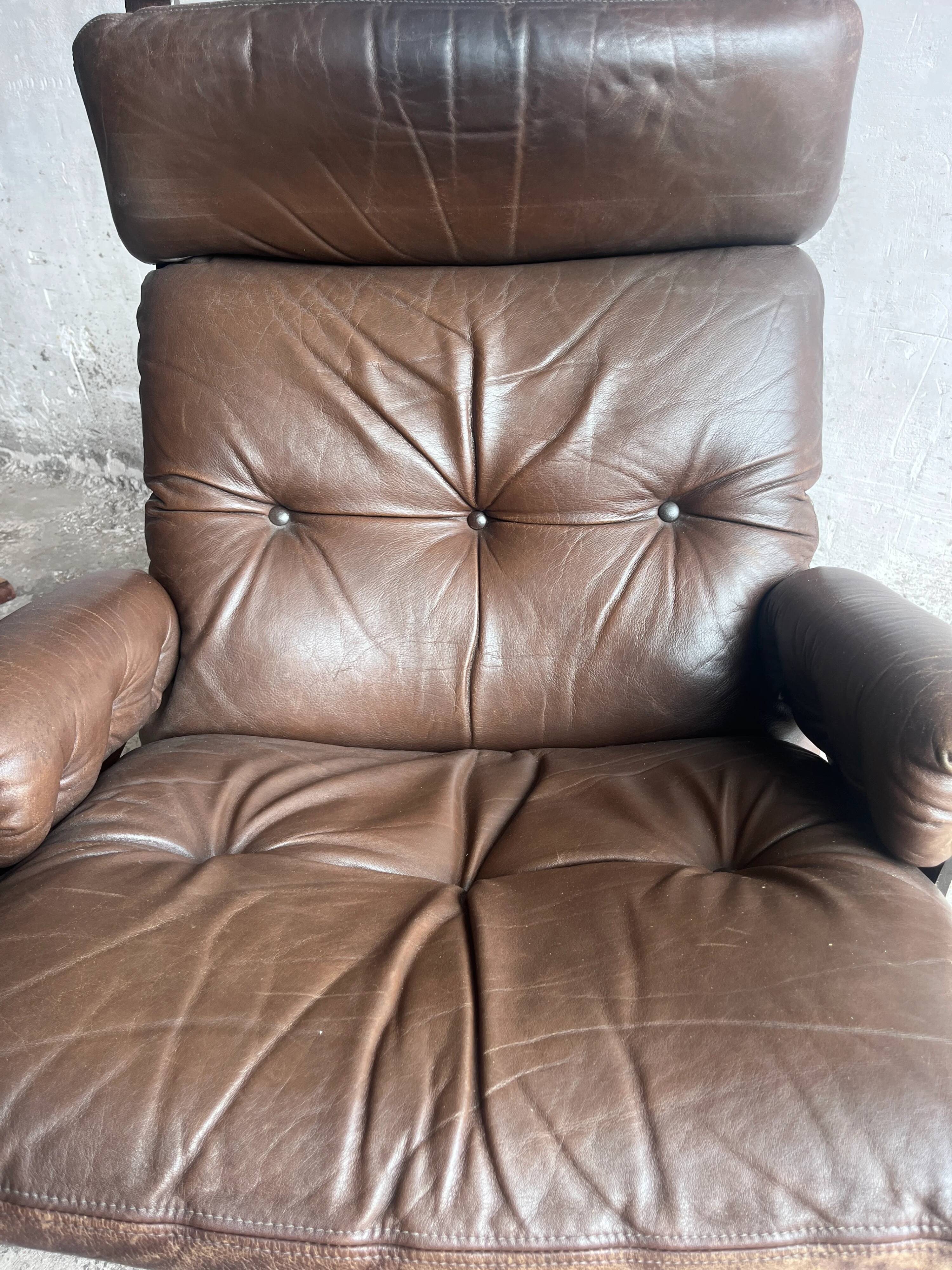 Vintage Scandinavian swivel lounge chair in leather, 1970s