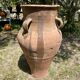 Ancient terracotta pottery jar