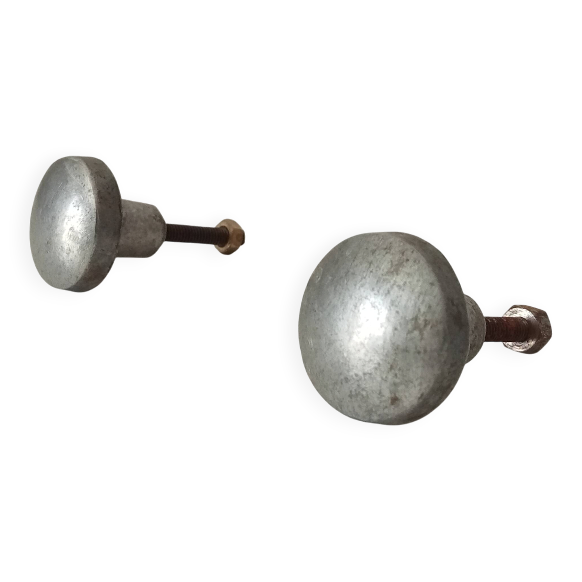 Pair of antique solid aluminium furniture handles.