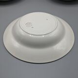 12 hollow porcelain plates, floral decoration and golden ledé - ∅: 23cm