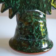 Green ceramic sun candlestick from Tamegroute, Morocco.
