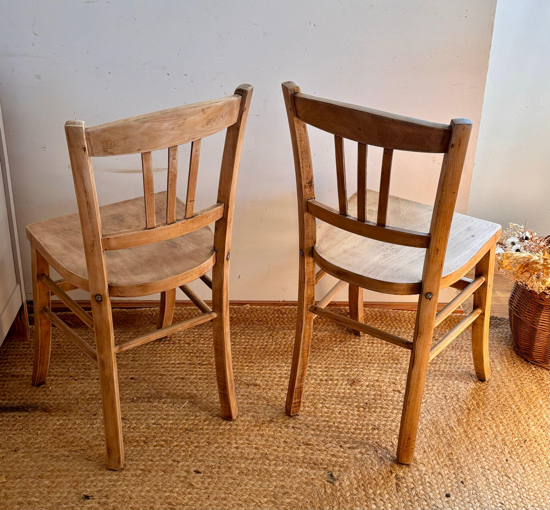 Set of 2 vintage bistro chairs in raw wood.