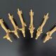 6 brass dromedary-shaped knife holders