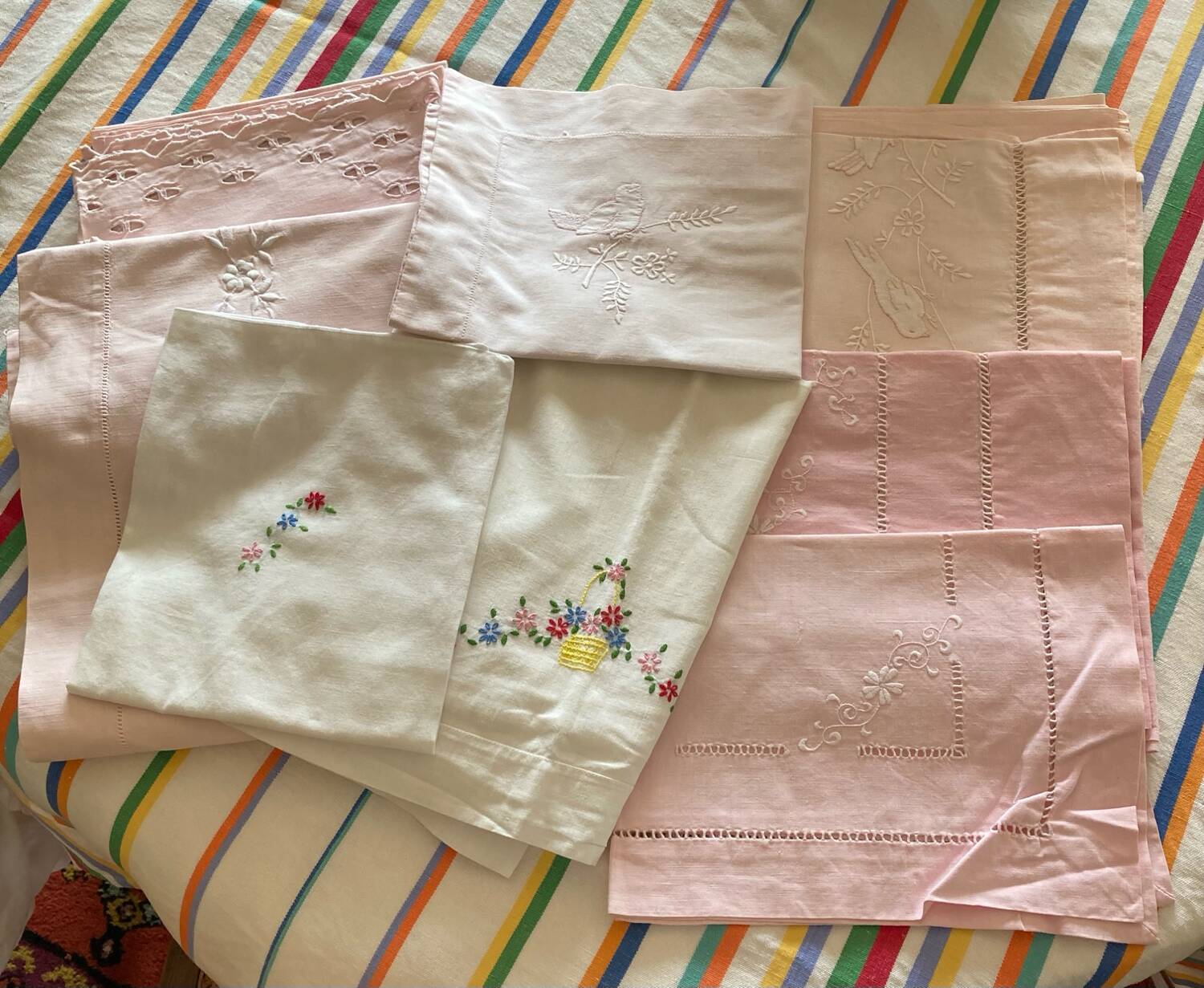 Set of embroidered baby bed sheets