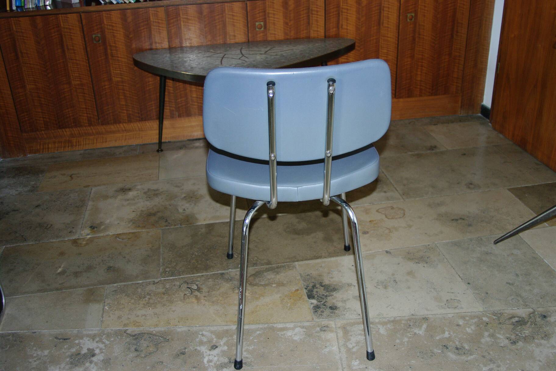 Vintage ski and chrome chair 1950