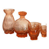 Pink glass liquor service and its accessories from the 1950s