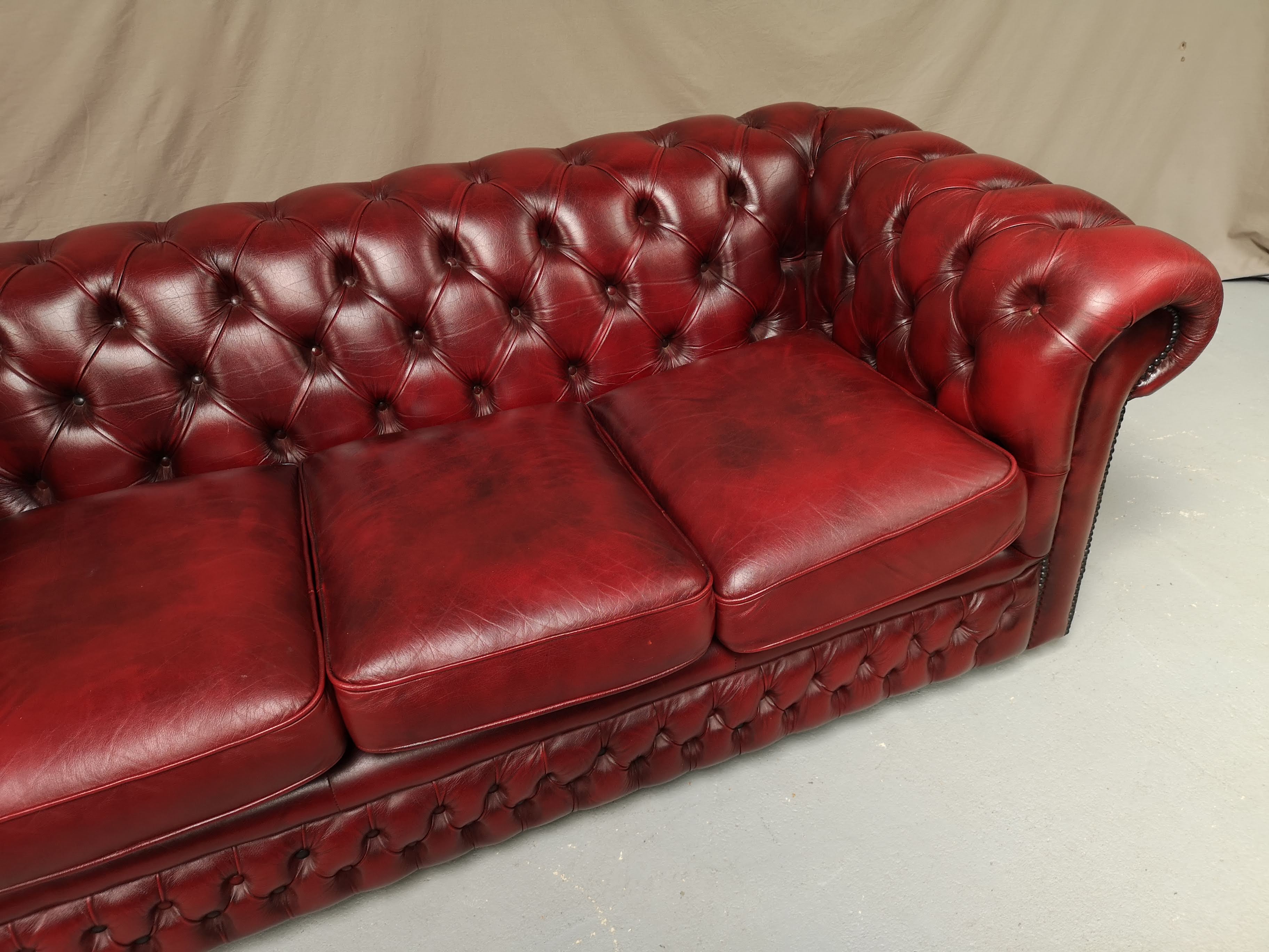 Red leather chesterfield sofa