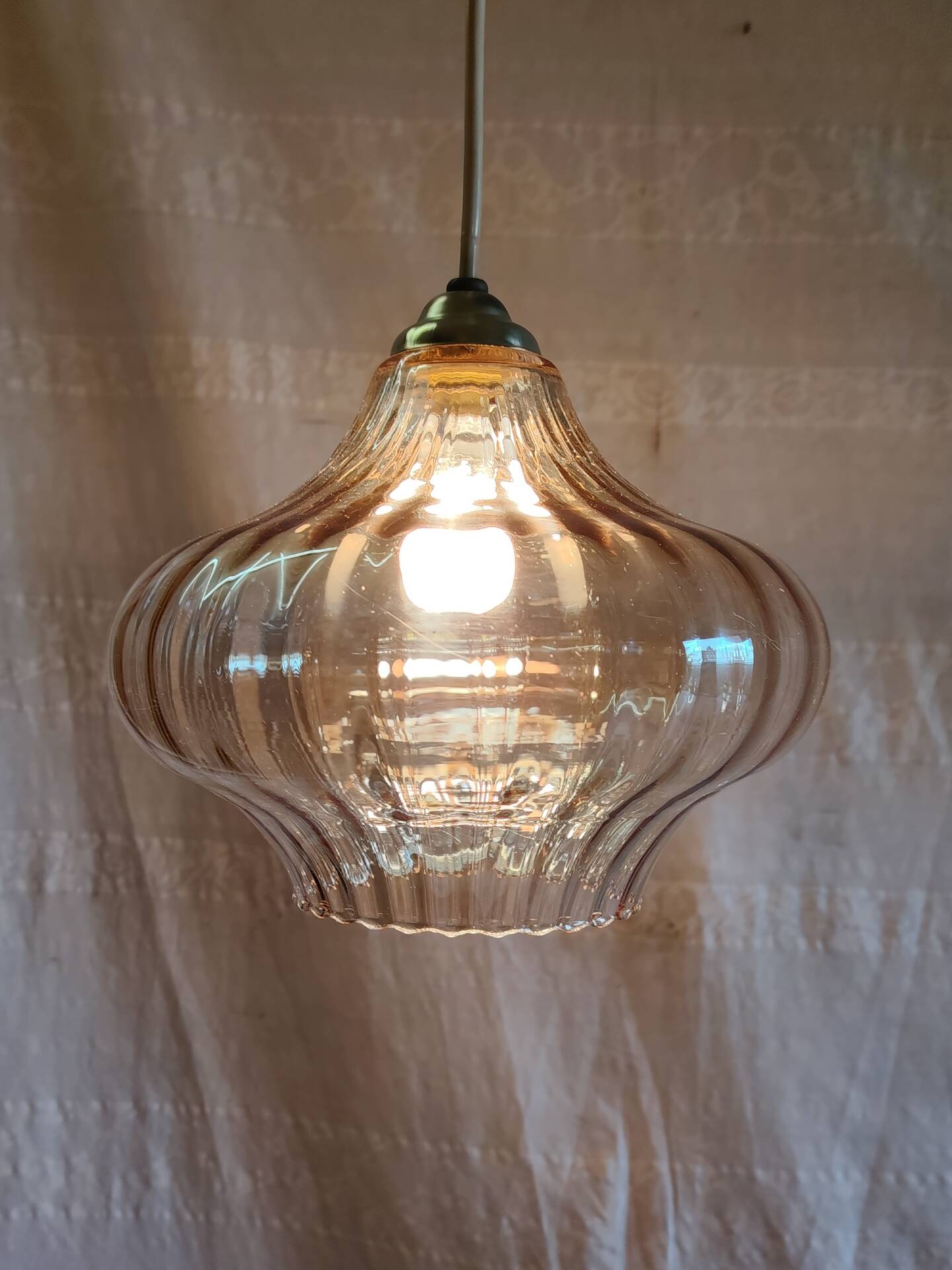 70's amber glass suspension design
