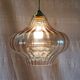 70's amber glass suspension design