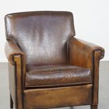 Sheepskin leather armchair with character and a touch of Art Deco design
