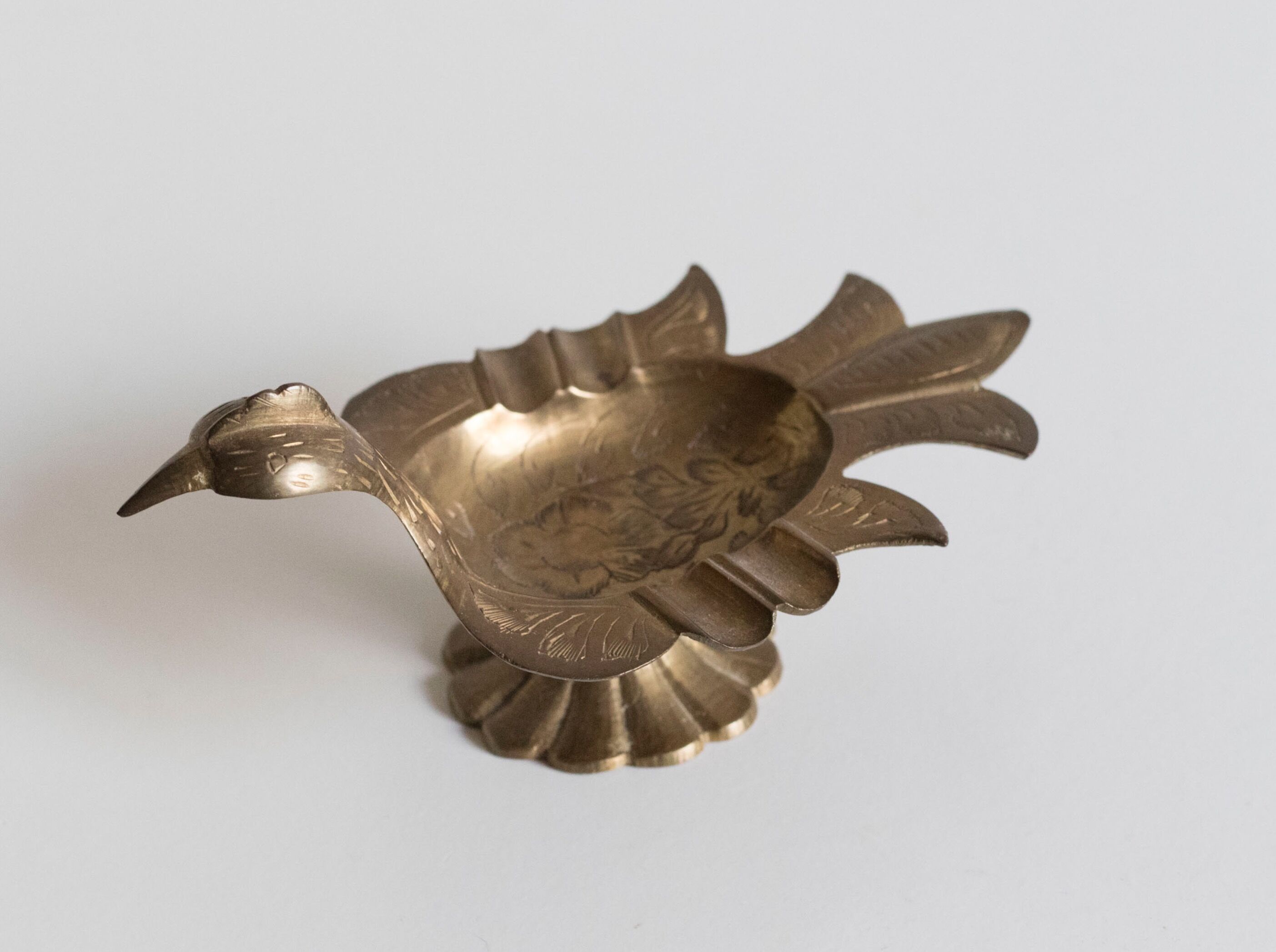 Empty pocket / old brass ashtray