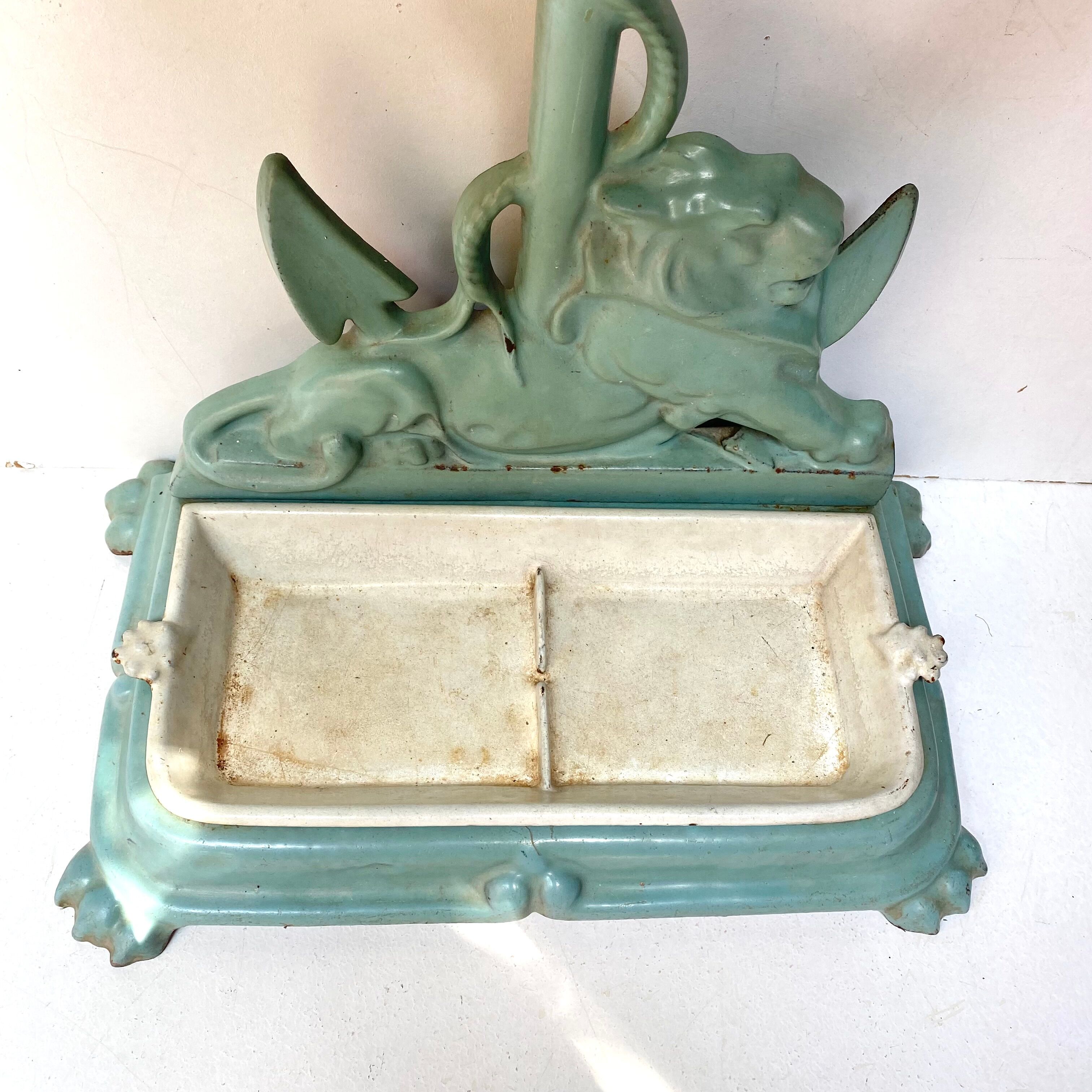Enameled cast iron umbrella stand from the early 20th century
