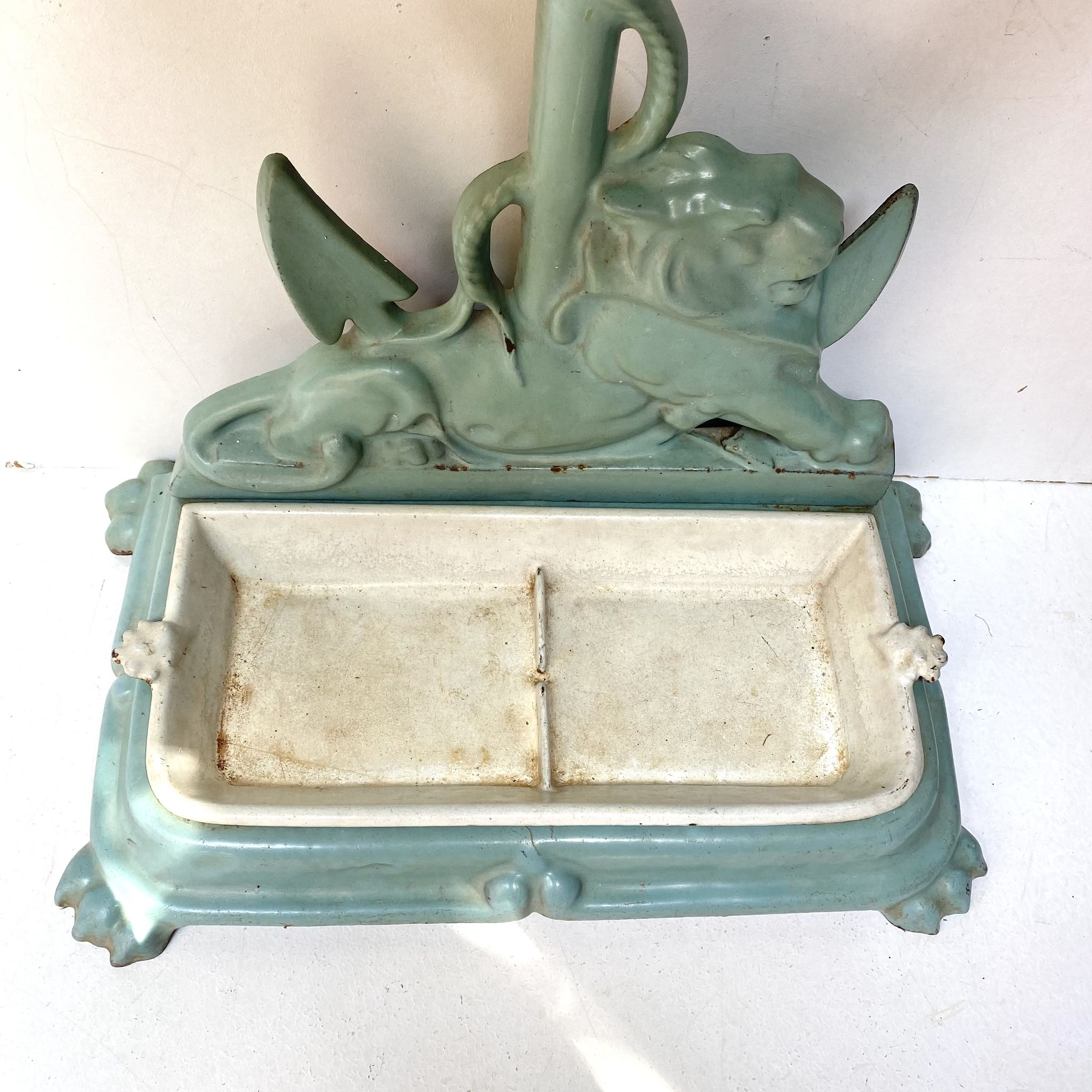 Enameled cast iron umbrella stand from the early 20th century