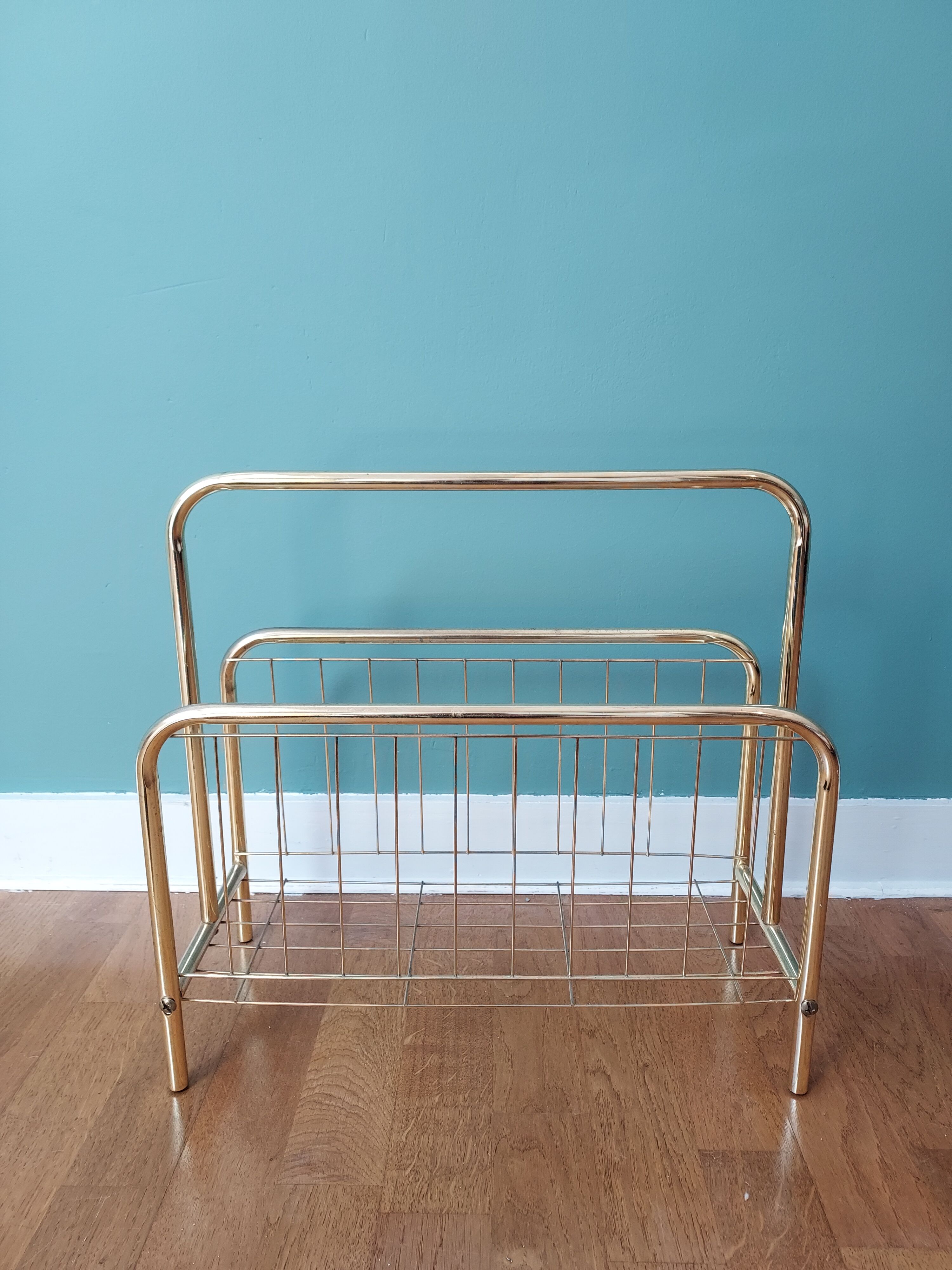 Gilded metal magazine door