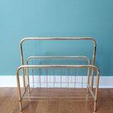 Gilded metal magazine door