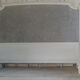 160-style louis XVI style headboard patinated pearl grey waxed finish, lined with grey velvet