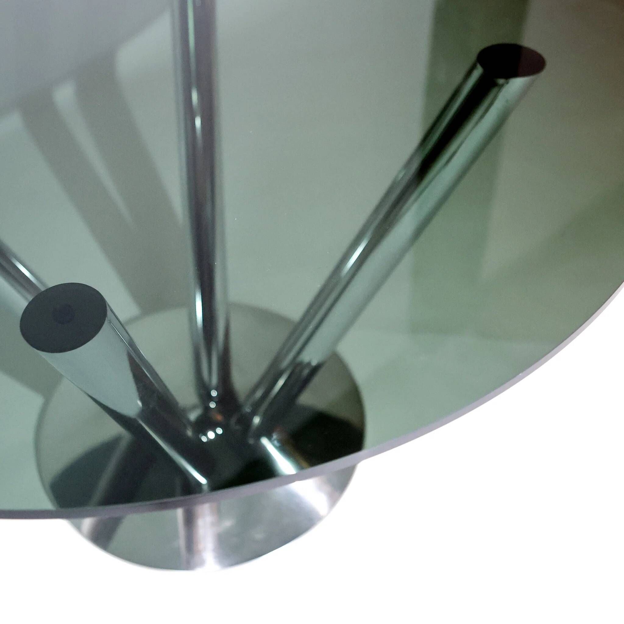 Vintage round dining table by Carlo Bartoli, smoked glass and polished chrome, Italy, 1970s.