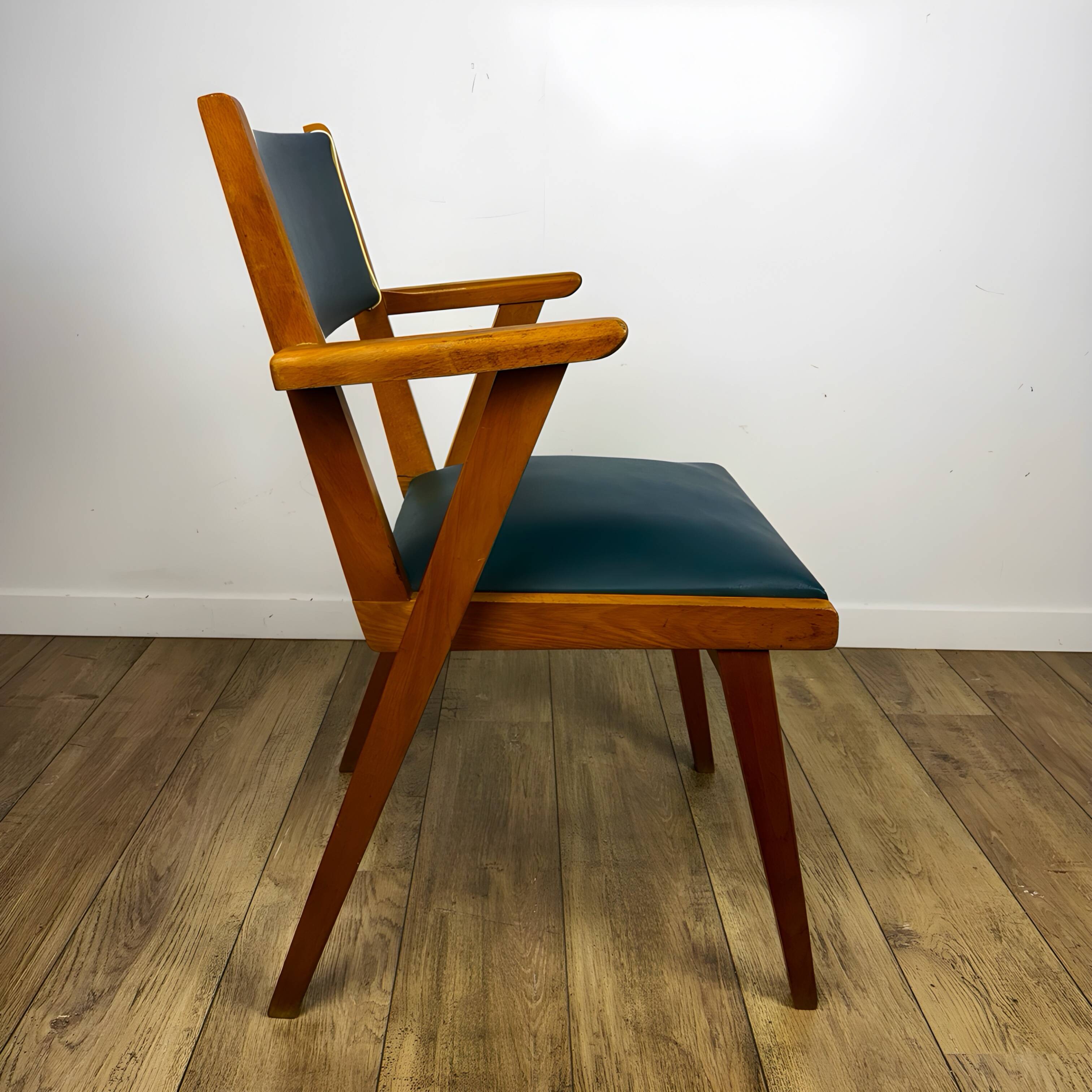 Pair of Scandinavian bridge armchairs in wood and vinyl from the 1950s.
