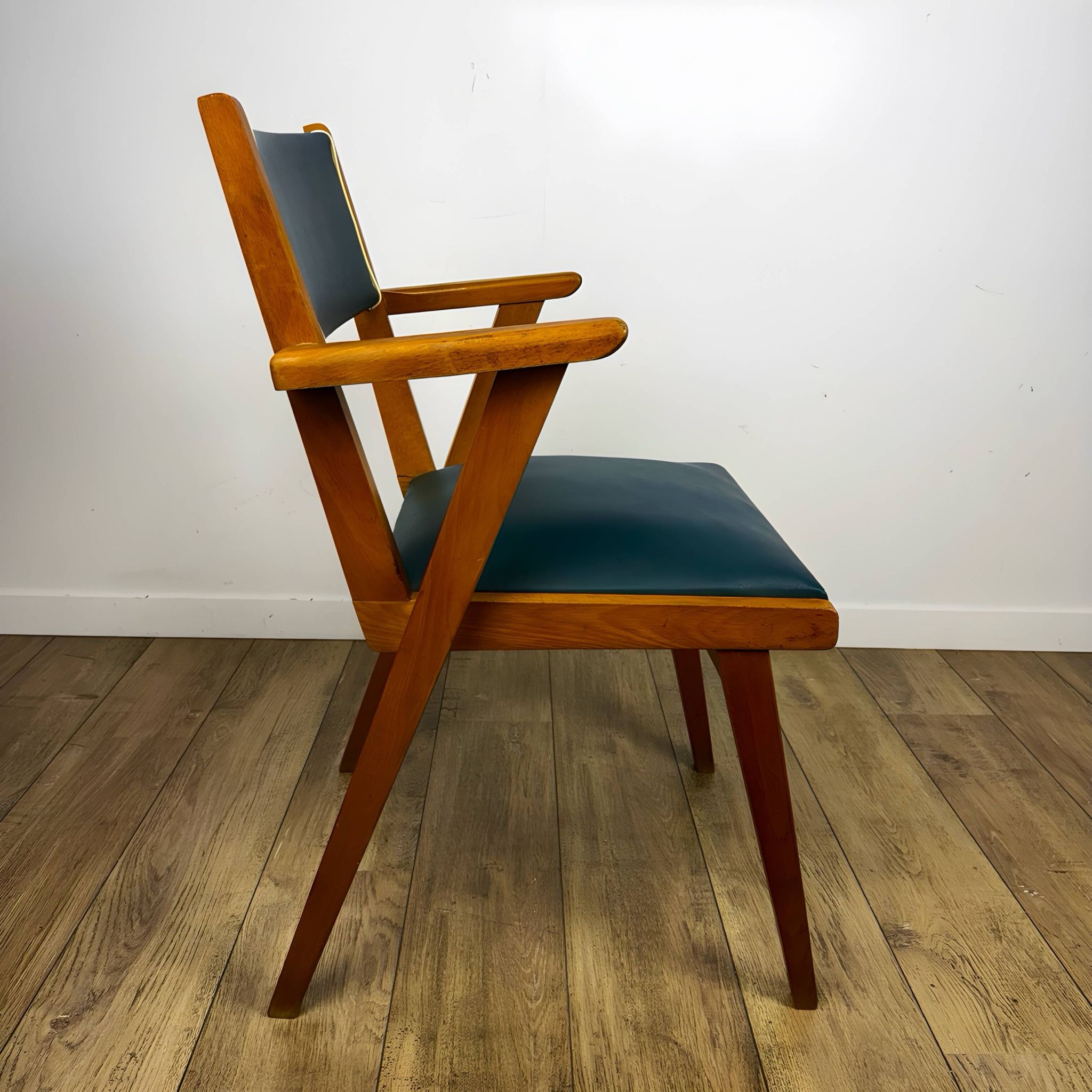 Pair of Scandinavian bridge armchairs in wood and vinyl from the 1950s.