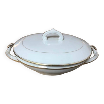 Vintage cream-colored tureen with its golden edging