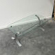 Design coffee table in brushed metal with a glass top, 1970s.
