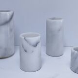 Four white marble candlesticks with black veins, 70s design