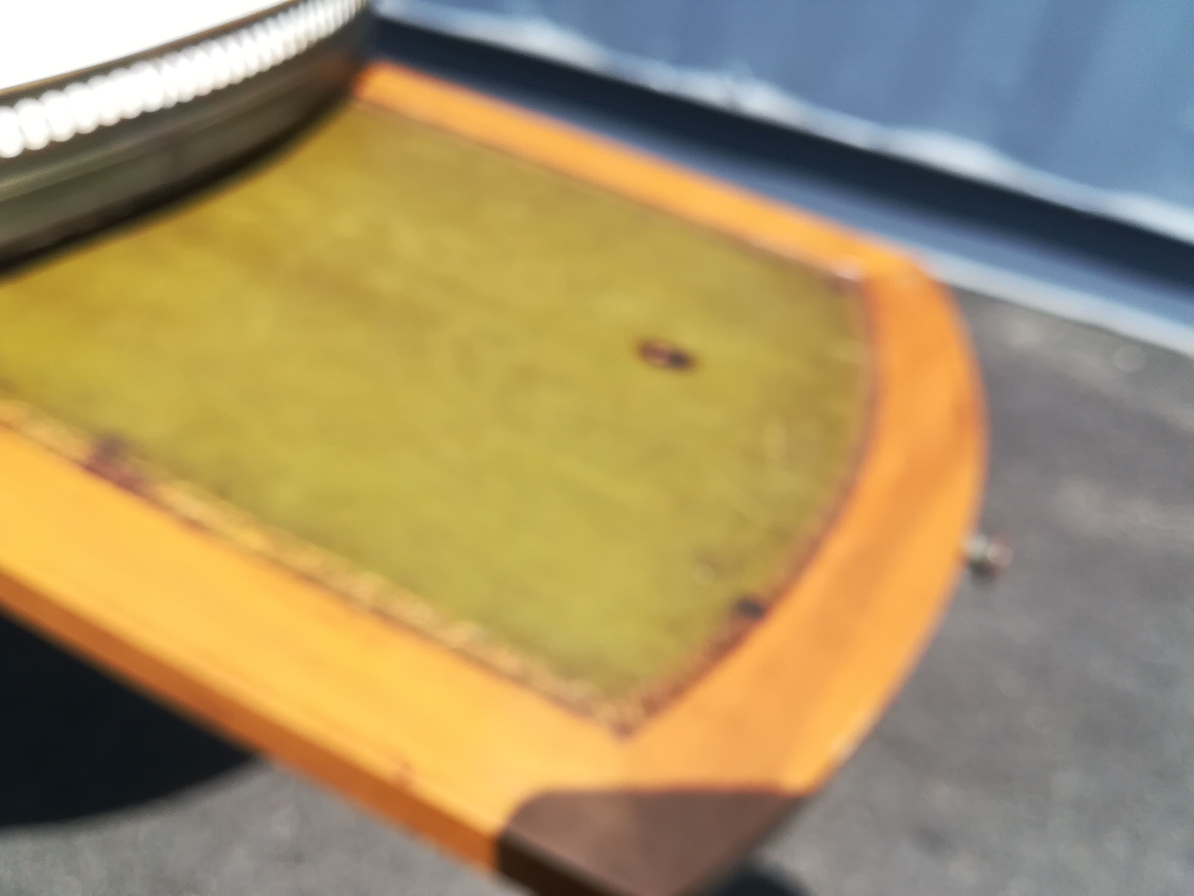 Oval marble and wood coffee table