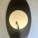 Large oval Italian mirror, modernist, space age design from the 1970s.