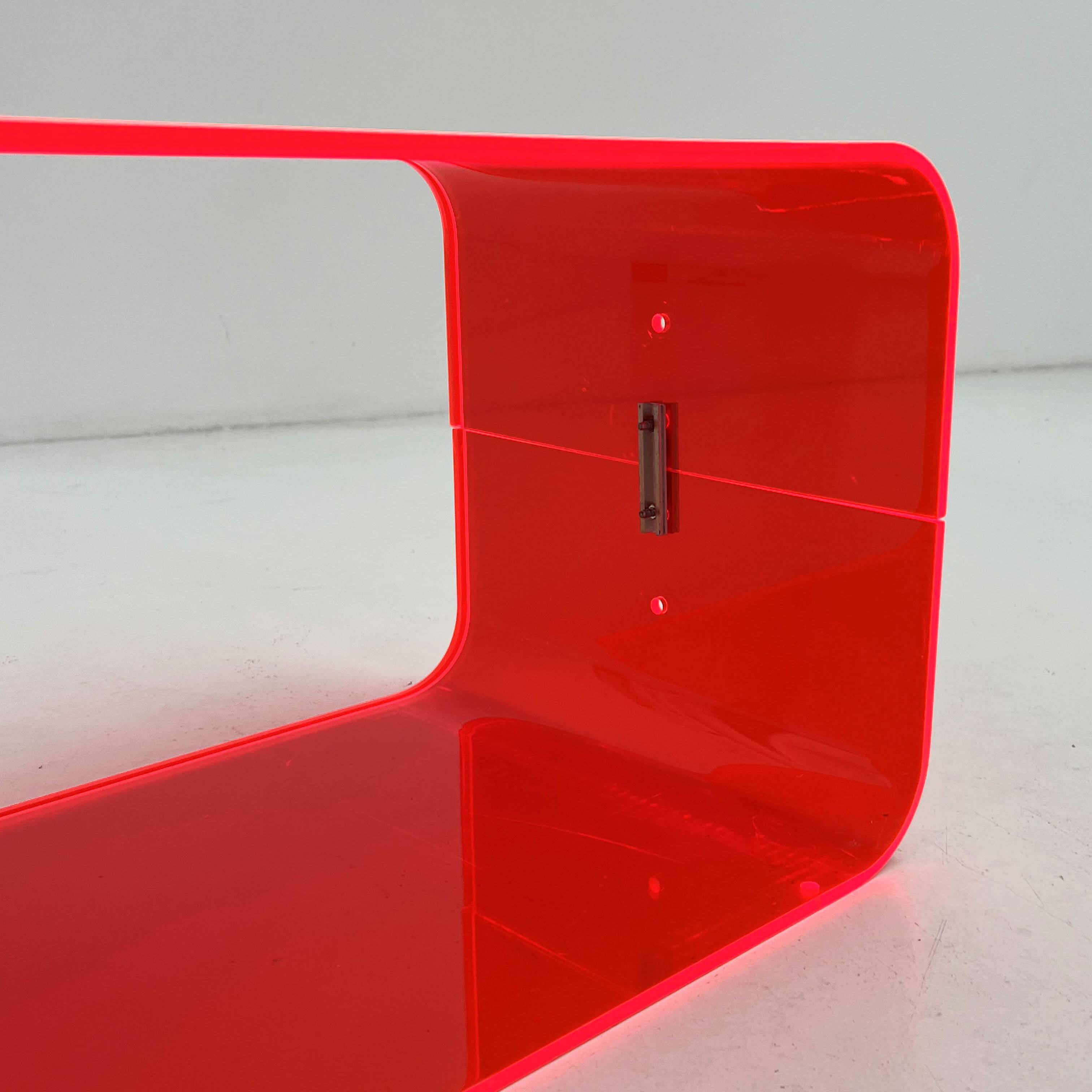 Fluorescent pink plexiglass coffee table, 1980.