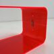 Fluorescent pink plexiglass coffee table, 1980.