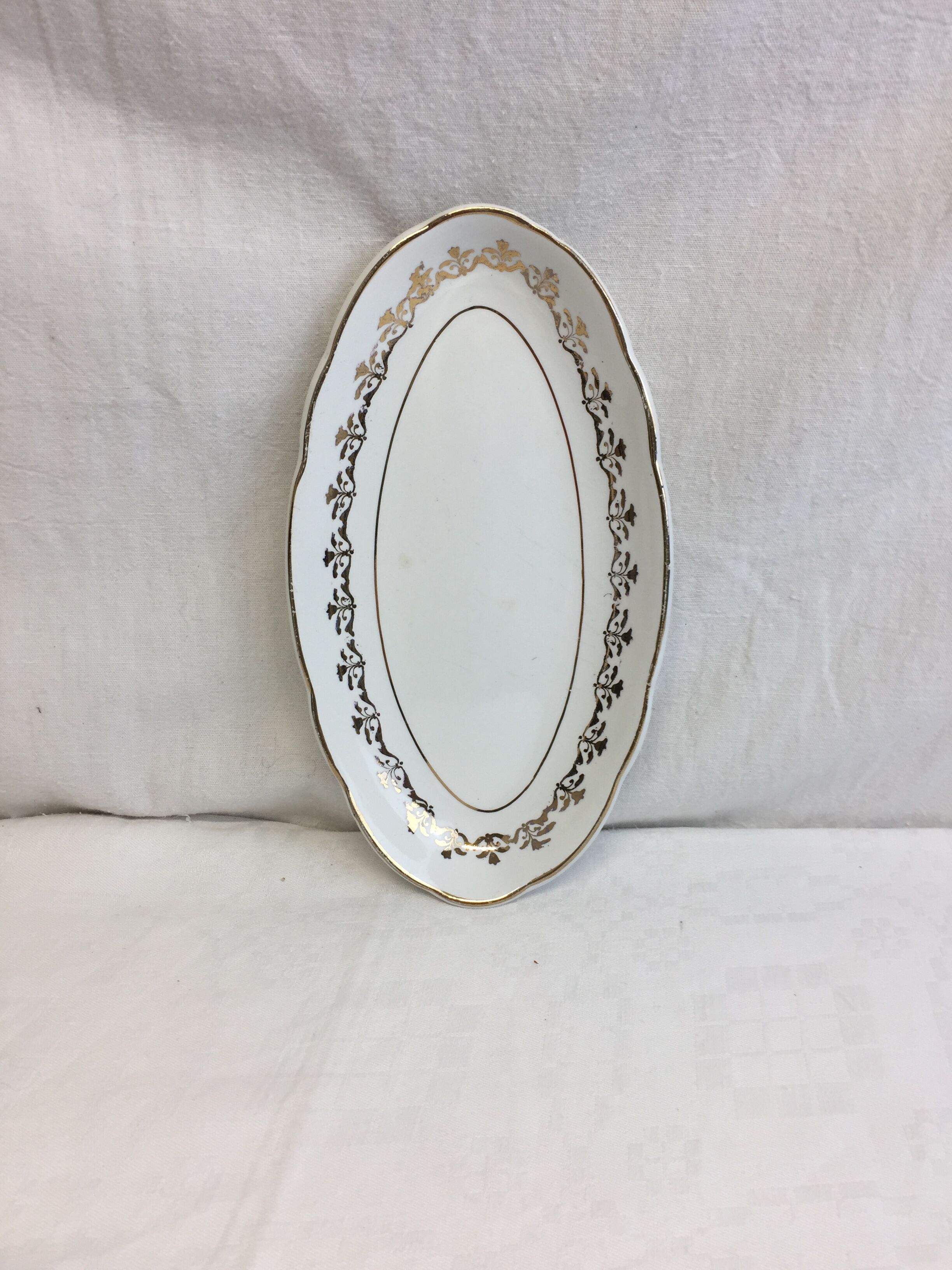 Antique oval shaped white and gold dish made in France Sarreguemines