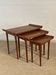 Set of three nesting low tables in a Japanese style, made of mahogany.