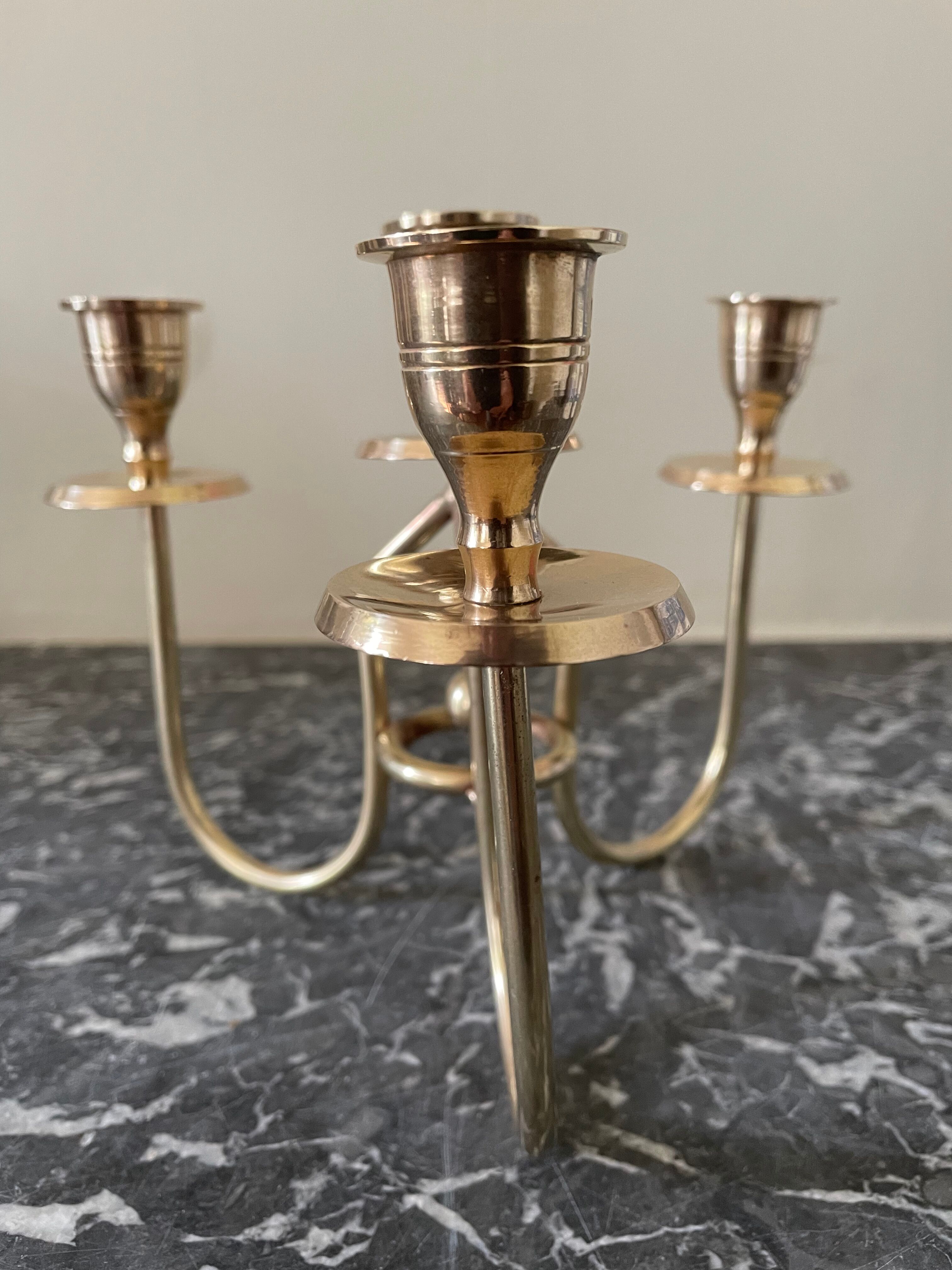 Golden brass candle holder