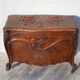 Old chest, carved wooden chest, curved chest on wheels, interior decoration