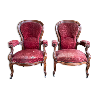 Pair of Louis Philippe period armchairs with rack and pinion