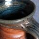 Pitcher traditional pottery Folk art in old enamelled sandstone