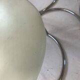 Chrome table and two modernist chairs