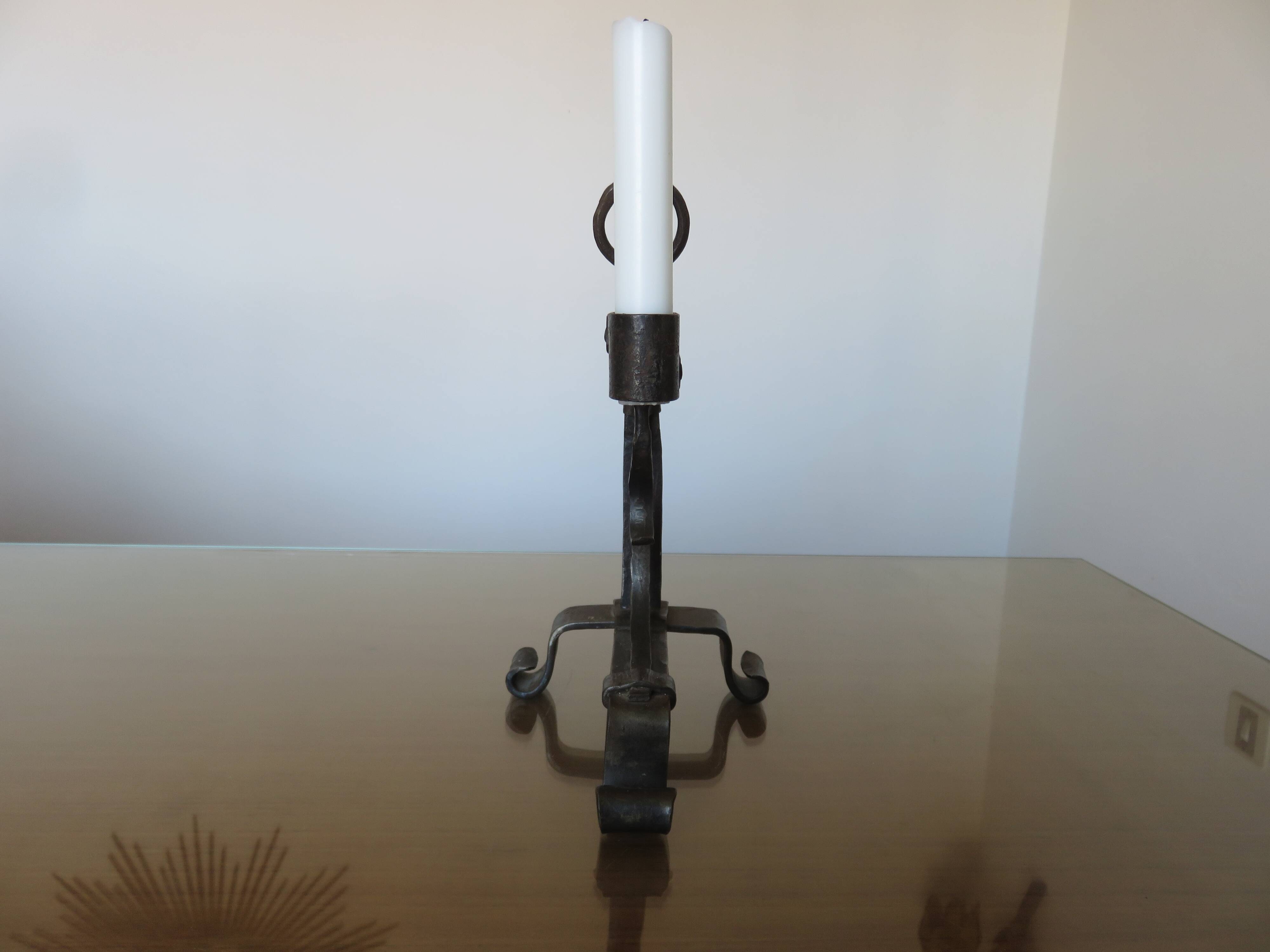 Brutalist candlestick in blackened wrought iron from the 1940s-50s.