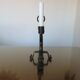 Brutalist candlestick in blackened wrought iron from the 1940s-50s.
