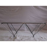 Minimalist coffee table in chrome metal and glass