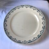 Round serving dish from the Longchamp earthenware factory, Doria model. Iron Land