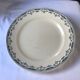 Round serving dish from the Longchamp earthenware factory, Doria model. Iron Land